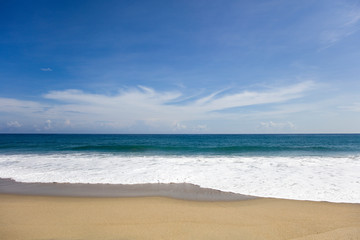 Fototapeta na wymiar Soft beautiful Caribbean sea wave on sandy beach