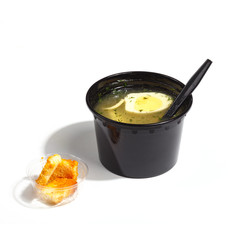 Various food in plastic packaging. The concept of fast food. White background.