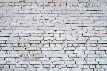 White brick wall. Empty horizontal background with old bricks and mortar. Copy space for text