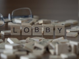 The concept of Lobby represented by wooden letter tiles