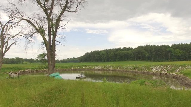 Small pond in rural Illinois, wide aria
