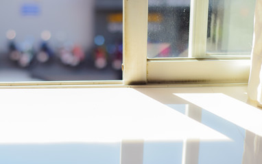 Sunshine and shadow reflection from window opening.