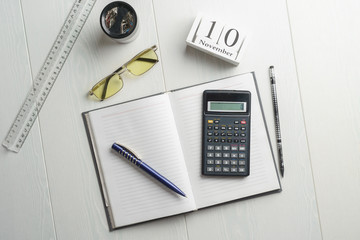 World Accountant Day, symbols, calculator, pen, notebook