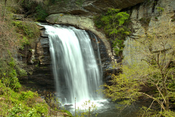 Fototapeta na wymiar Waterfalls flowing over rocky cliffs