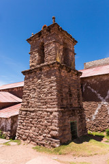 Fototapeta na wymiar Tower of the church of Taquile Island in Puno, Peru, 