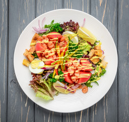 Seafood Caesar Salad with Shrimps, Salad Leaf, Croutons, Cherry Tomato and Cheese