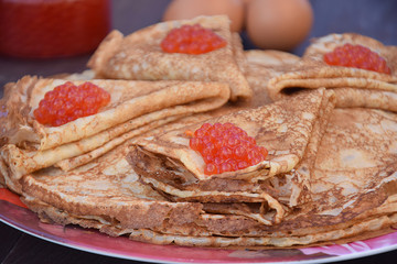 Pancakes with red caviar
