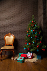 vintage chair near the Christmas tree with New Year's gifts