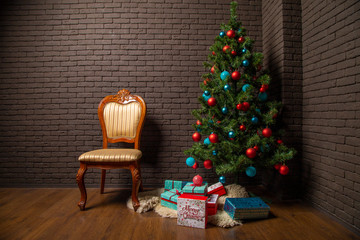 vintage chair near the Christmas tree with New Year's gifts