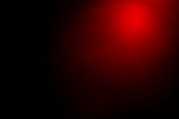 Red bokeh mistical abstract background. Defocused light.