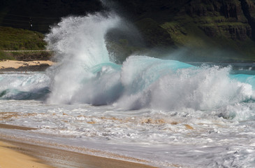Shore waves breaking on the coast of Oahu Hawaii