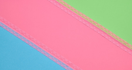Fashion Coloful pink green blue background with lace. Minimal. Trendy spring summer color. Creative vibrant pop art fashionable concept. Banner