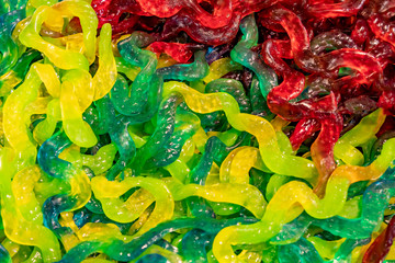 .Colored candies close-up. Jelly Worms. Candy background.