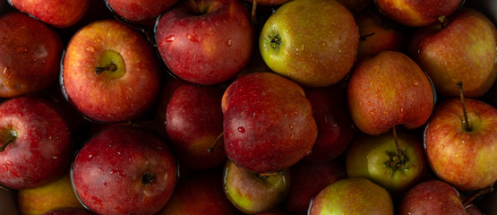Red apples as background and text