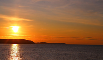  Bright sunset at sea. Evening.
