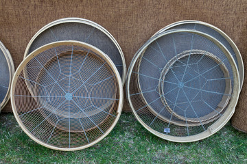 round handmade sieve of different sizes