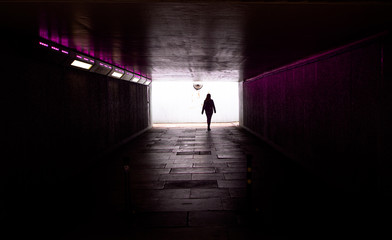 Woman in tunnel