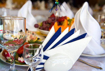 Beautiful festive table setting. Delicious snack on their plates