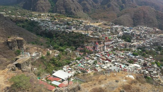 Aerial drone shot of the town and Sanctuary of Chalma from the cliffs, Mexico