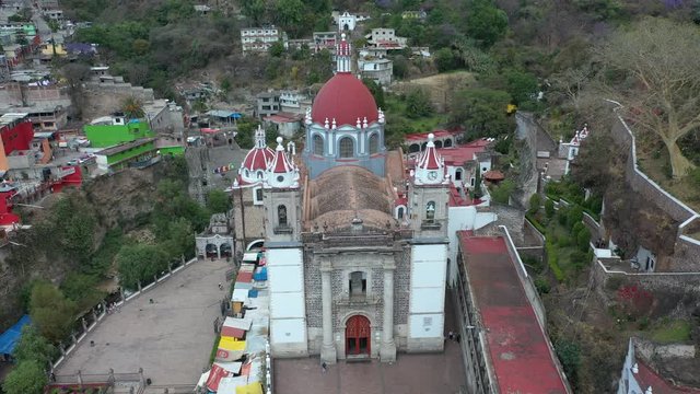 Aerial drone video fo the Christian Sanctuary of Chalma with birds flying, Mexico