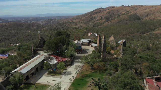 Aerial drone view of the old mining machinery and the main shaft of a colonial silver mine