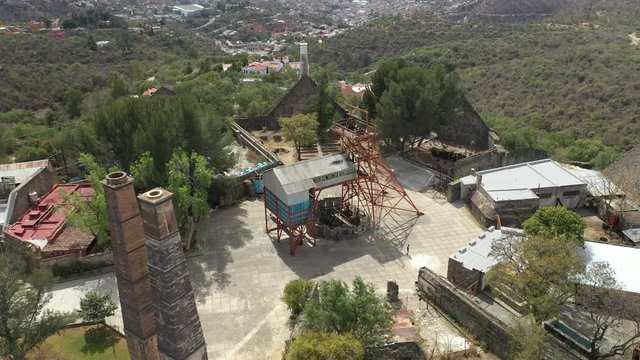 Aerial drone video of the mining machinery and shaft of the spanish colonial mine of La Valenciana, Guanajuato, Mexico