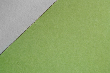 Fototapeta premium Paper background with paper texture green sheet of paper. Overlaid sheets of paper.