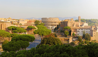 Fototapeta na wymiar Panoramic view of Rome. Cityscape skyline of landmarks of Ancient Rome: Coliseum and Roman Forum famous travel destinations of Italy.