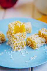 Homemade pumpkin candies with coconut