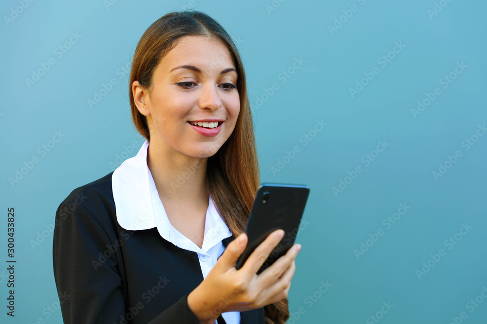 Canvas Prints Young business woman chatting with mobile phone outdoors. Copy space.