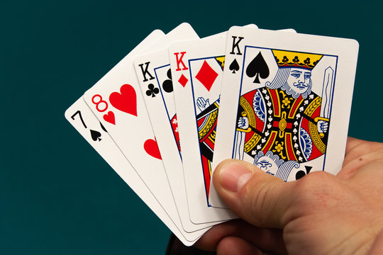 five different play cards in a hand