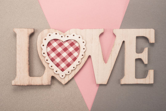   Love sign on color paper 