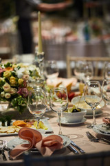 A luxurious covered table for the holiday in an expensive restaurant.