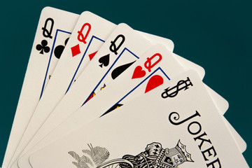 combination of five different play cards with jocker