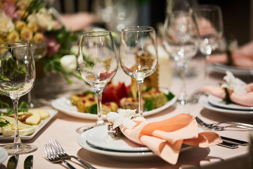 A luxurious covered table for the holiday in an expensive restaurant.