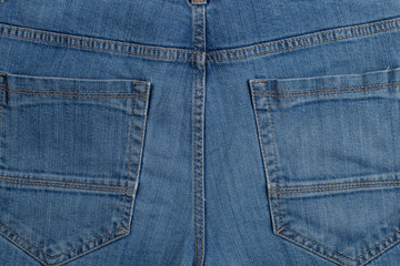 Fototapeta premium Blue jeans close-up, back pocket, casual style.