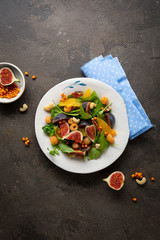 Vegan salad with oranges on plate