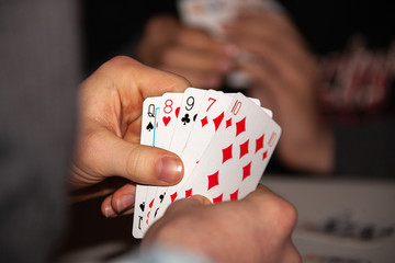 combination of four different play cards in a hand