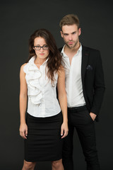 Confident of success. Business partners with confident look. Confident couple in formalwear. Confident in starting business together. Startup