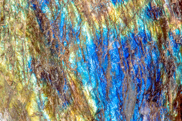 Macro shooting of gem raw natural Labradorite mineral texture as very nice natural background