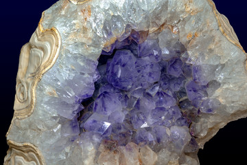 Close-up of raw Amethyst druse .Gemstone - detail.