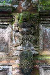 Stone carving Pura Dalem Penunggekan Temple Bali Indonesia