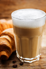 Coffee drink with fresh croissants