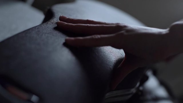 Case opens and violin is taken out close-up in slow motion. Musician is going to start playing the violin