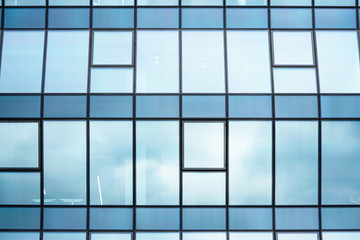Modern glassy office building with nice light reflection