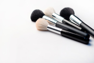 Professional makeup tools, flatlay on white background