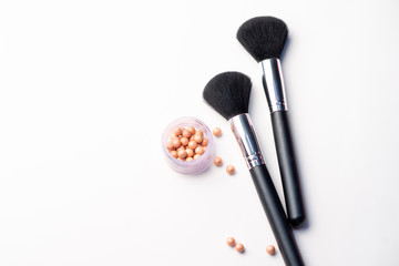 Professional makeup tools and blush meteorites, flatlay on white background
