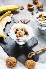 Chia pudding parfait puff with banana, yogurt and nuts