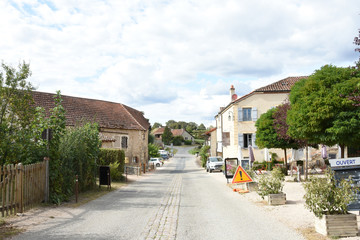 street in Burgundian village with restaurant