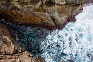 The dangerous The Gap cliff in Western Australia near Albany and Natural Bridge in Torndirrup...